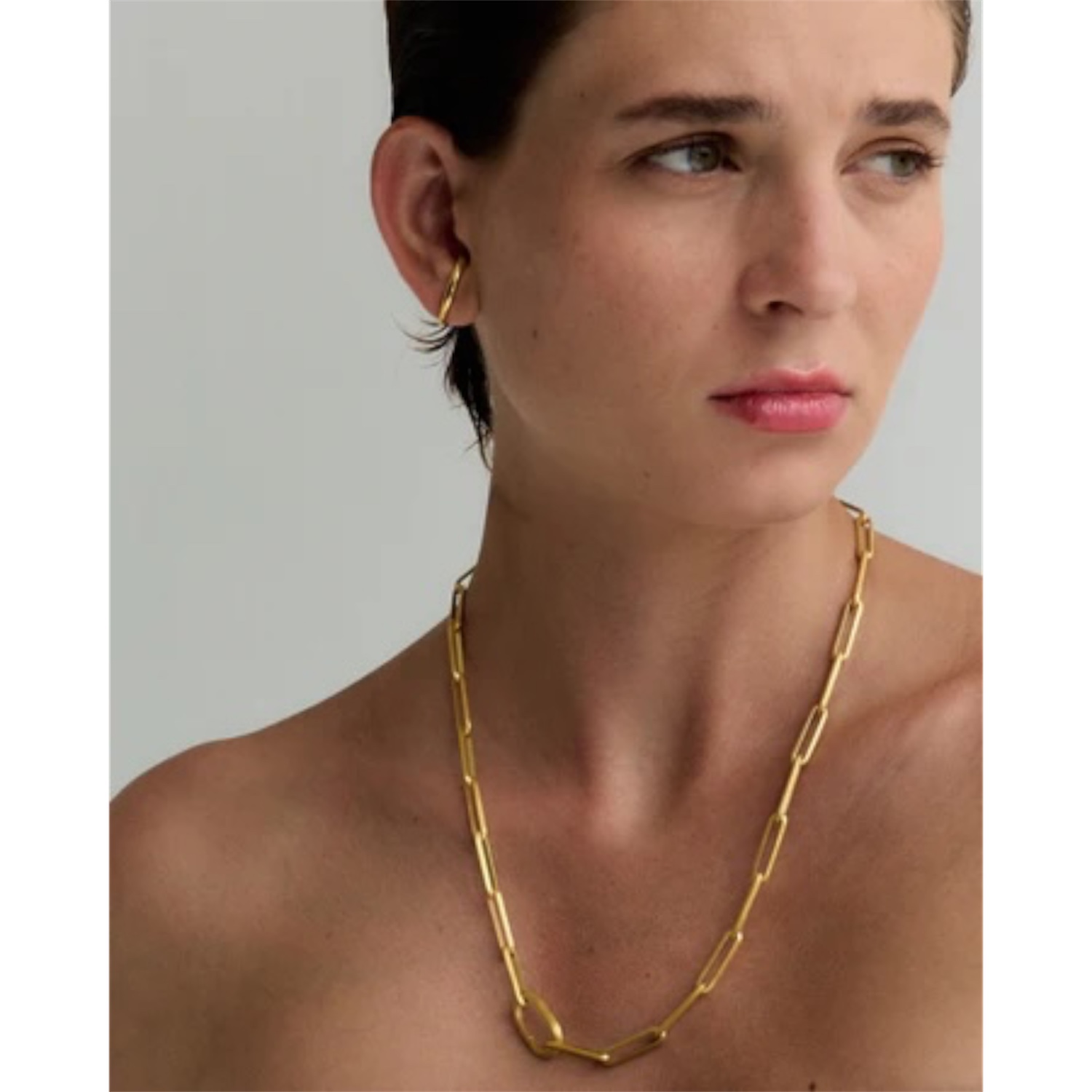 Golden earpiece eclipse | Adorn